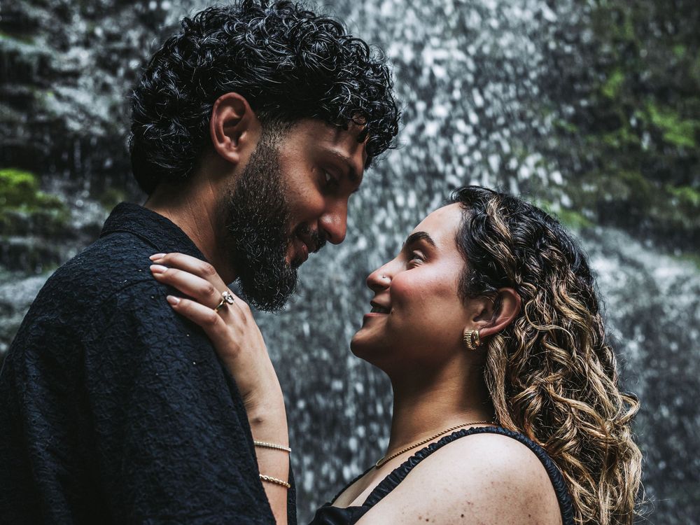 Intimate portrait sequence of a couple against a misty waterfall background.