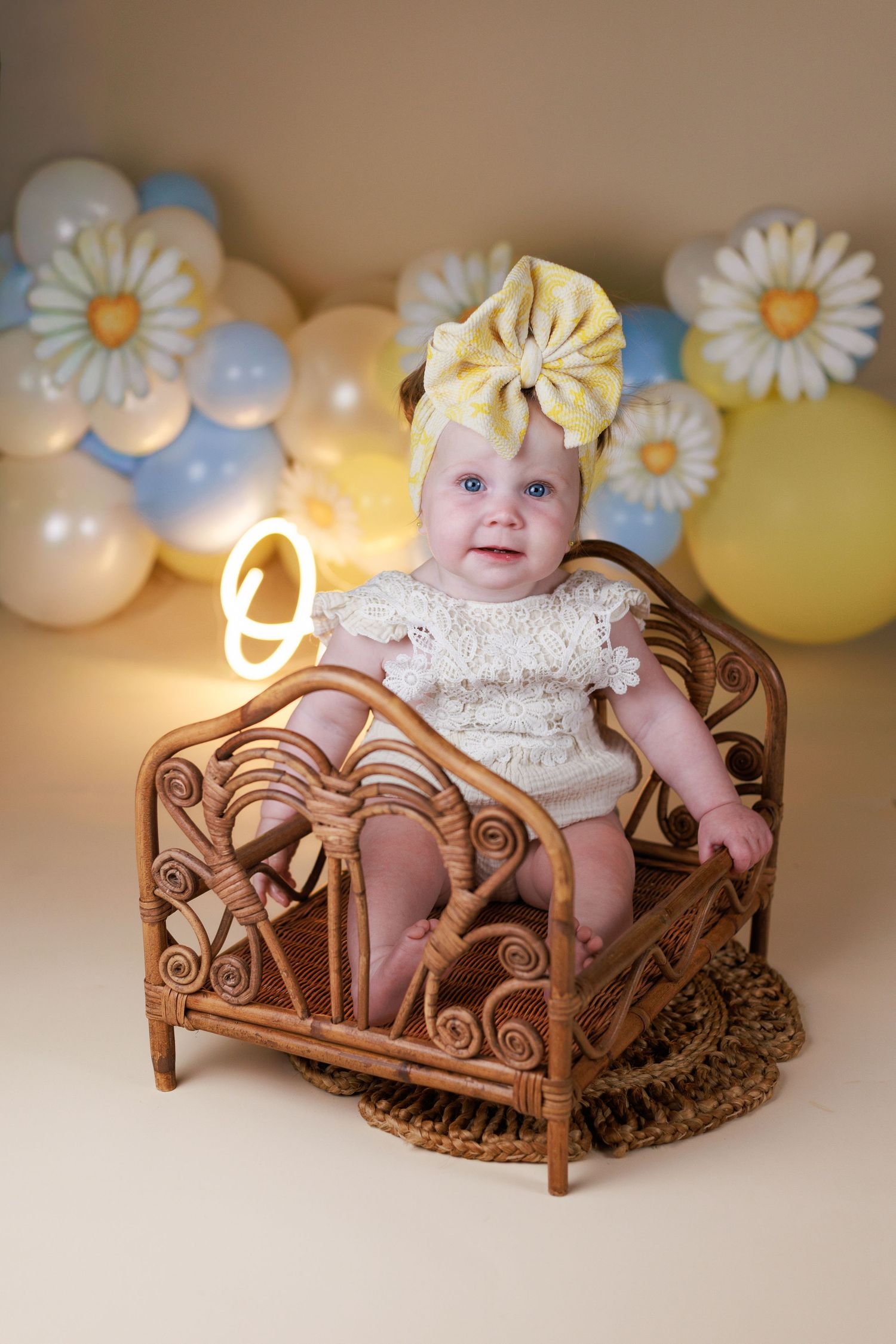 Bamboo bed with swirls and heart details for newborn posing during sessions