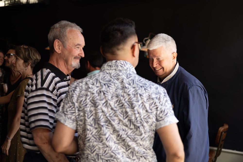 A series of candid photos showing two people leaning in close together and sharing laughter in various poses.