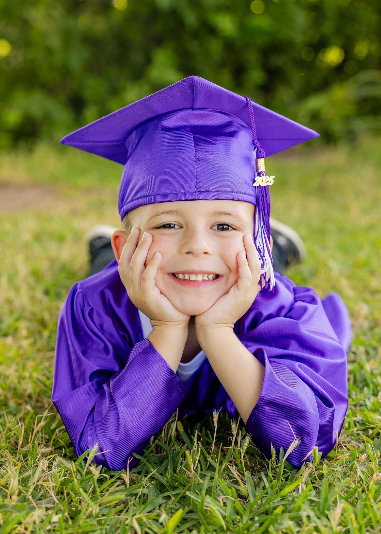 photo of graduating little boy in cap and gown in abilene texas west texas