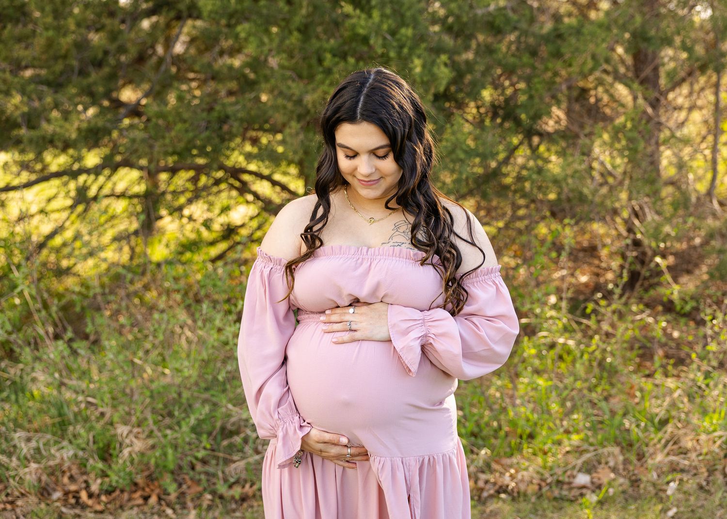 maternity picture of expecting mother in nature