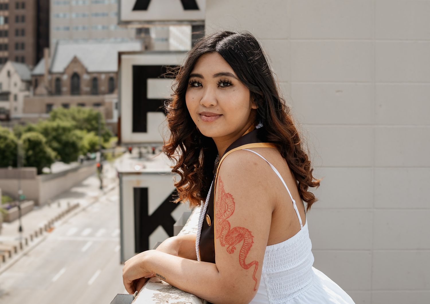 photo of girl on a parking garage rooftop