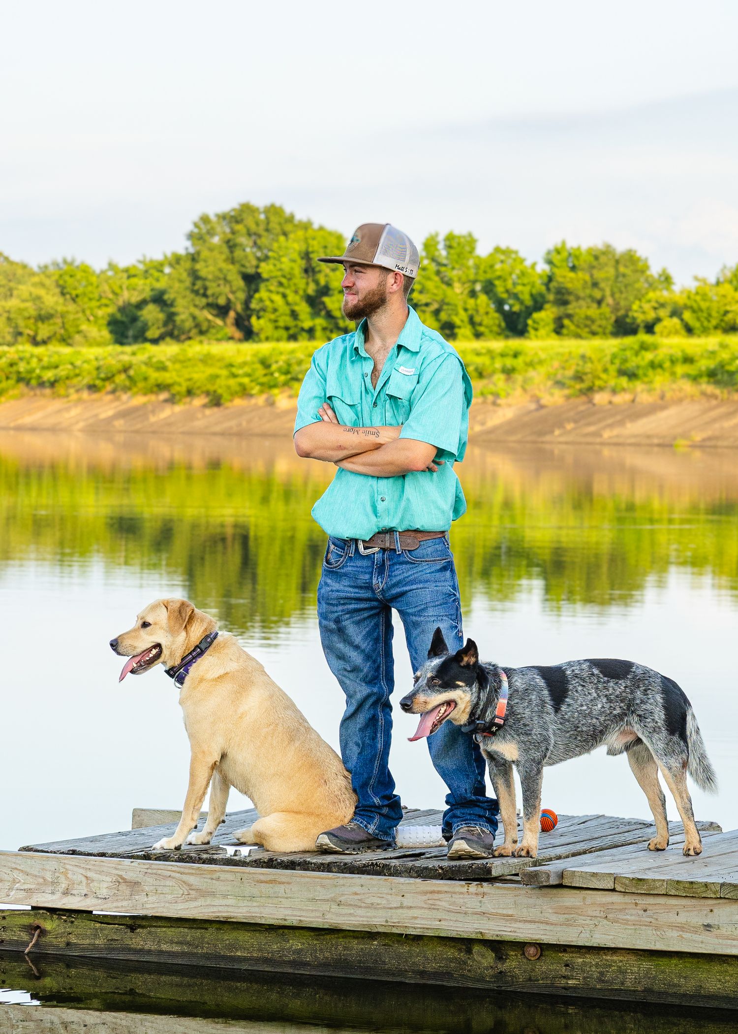 photo of boy for his small business with his dogs