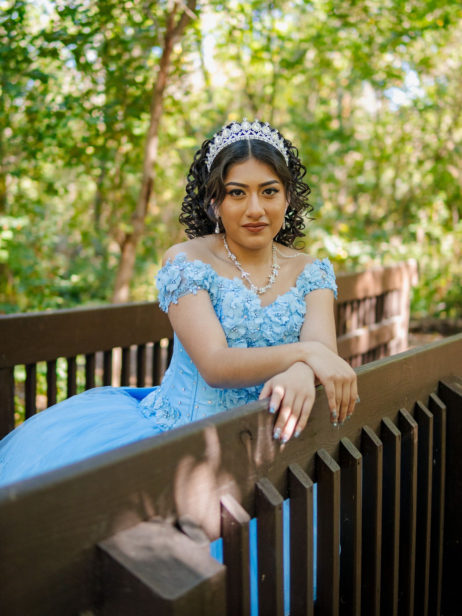 quinceañera photo of girl in a park in nature