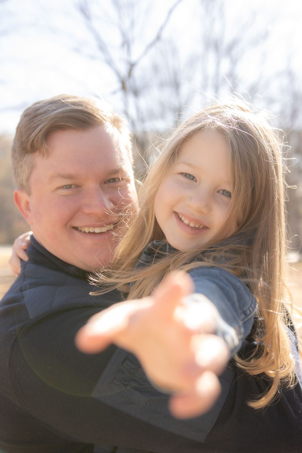 Playful family moments captured in a sequence of warm outdoor portraits with natural lighting and joyful expressions.