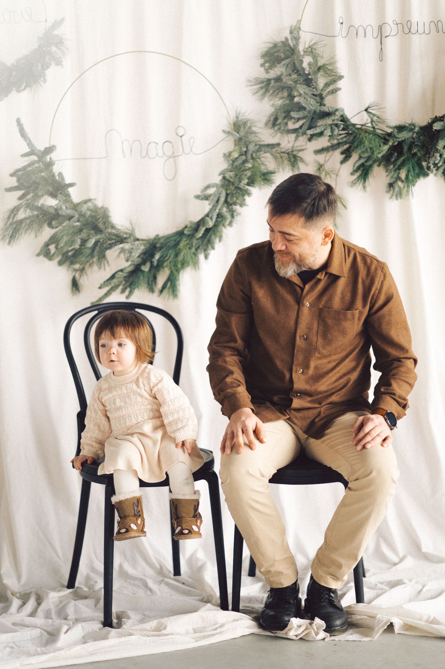 Progressive photo sequence of bonding moment between parent and child sitting on black chairs against a winter backdrop.