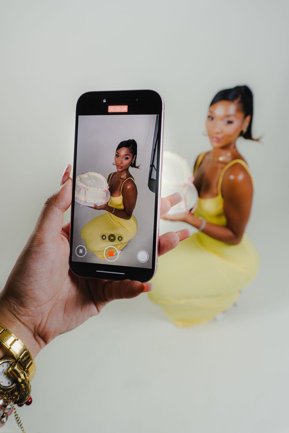 Smartphone photography showing creative angles of studio portrait session.