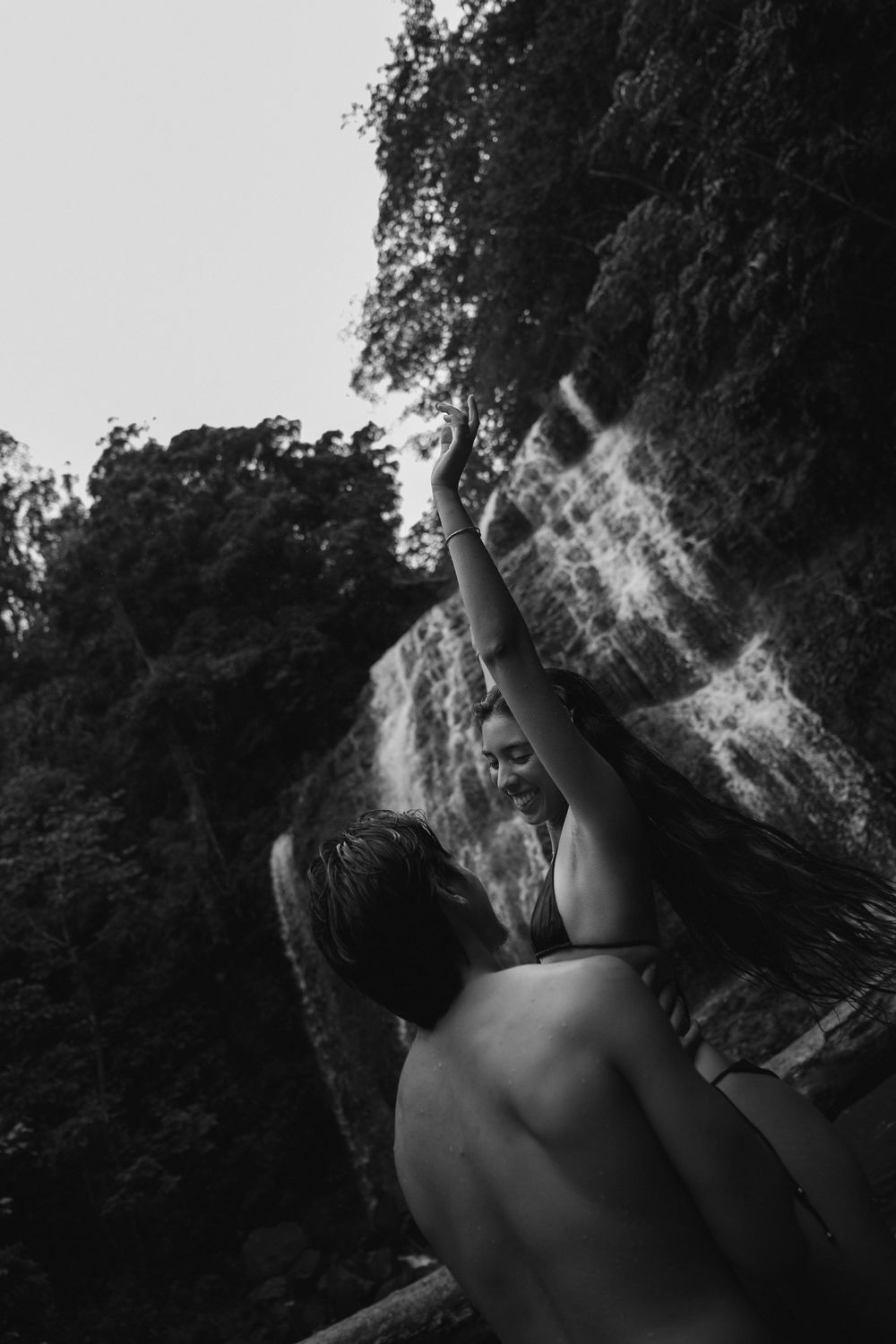Kauai couples photographer, couple swimming in waterfall photos, hawaii couples photographer