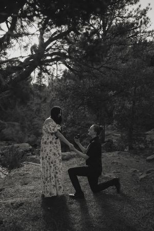 Lesbian couple getting engaged in the Utah mountains