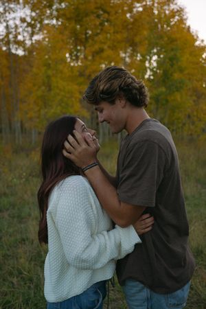 Autumn engagement session on Cedar Mountain in Utah with golden fall foliage