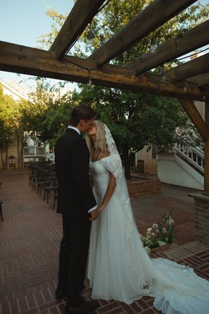 Bride and groom kissing at The Bentley House in St. George, Utah