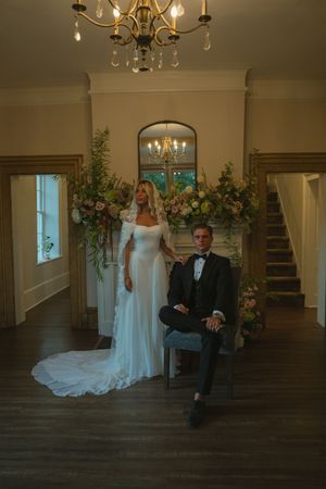Bride and groom posing for a documentary photo at The Bentley House in St. George, Utah