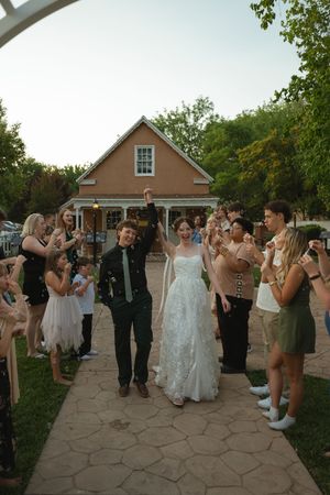 Couple's wedding exit with bubbles