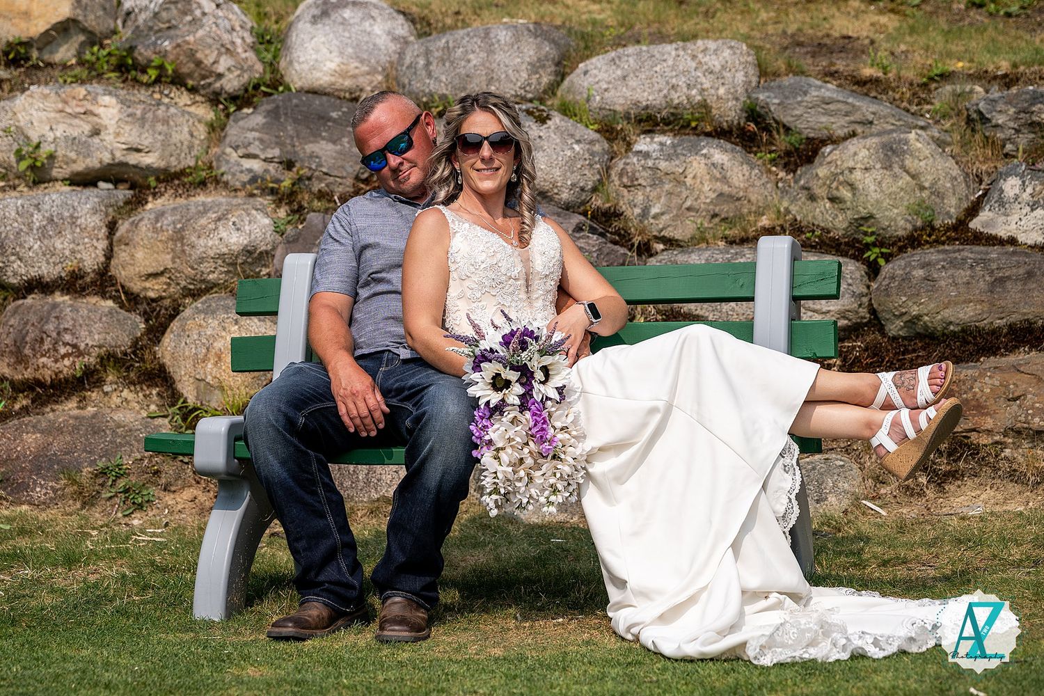 A sequence of tender moments shared beside large moss-covered boulders in a natural outdoor setting.