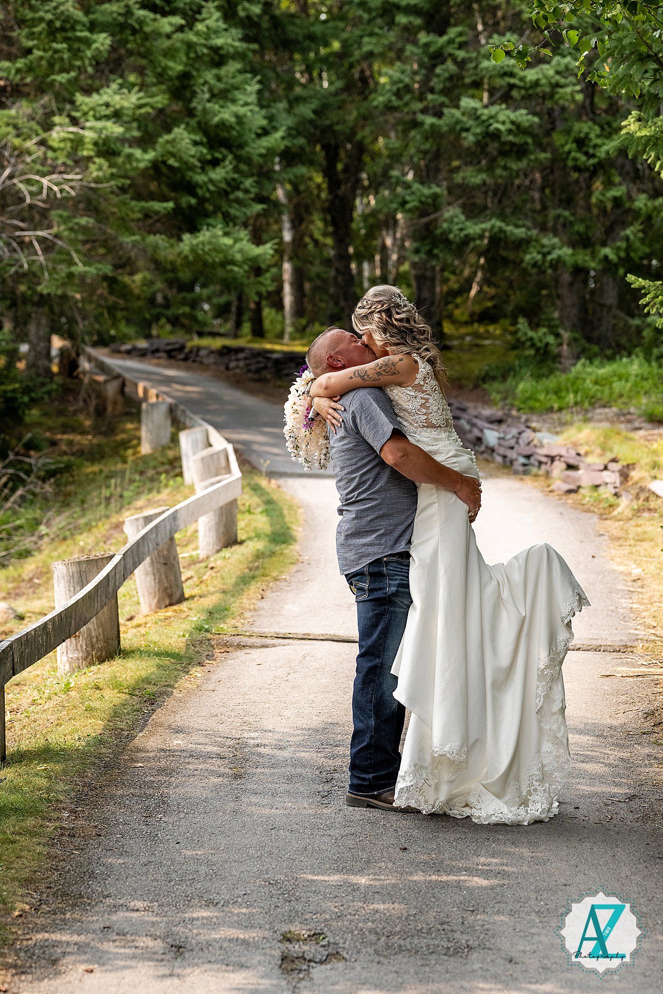 A romantic series of moments captured on a winding path through lush greenery and rustic wooden fencing.