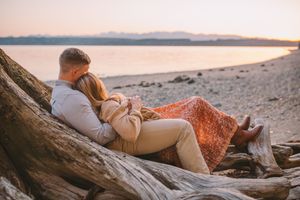 Couple enjoying each other during their beach photoshoot on Island County Whidbey Island Washington