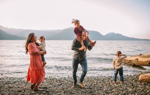 Family standing together during their family photoshoot at Whidbey Island near Seattle, Washington