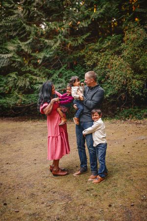 Family standing together during their family photoshoot at Whidbey Island near Seattle, Washington