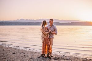 Couple dancing with each other during their beach photoshoot on Island County Whidbey Island Washington
