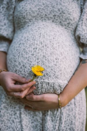 Mother and baby belly closeup during her maternity photoshoot at Whidbey Island near Seattle, Washington