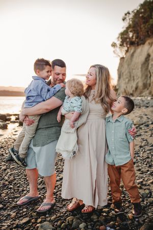 Family together during their family photo session in Deception Pass near Seattle Washington