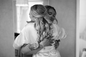 A series of black and white candid getting ready photos showing preparations for a special event.