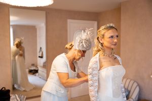A sequence of warm-toned photos showing wedding day preparations in a sunlit room.