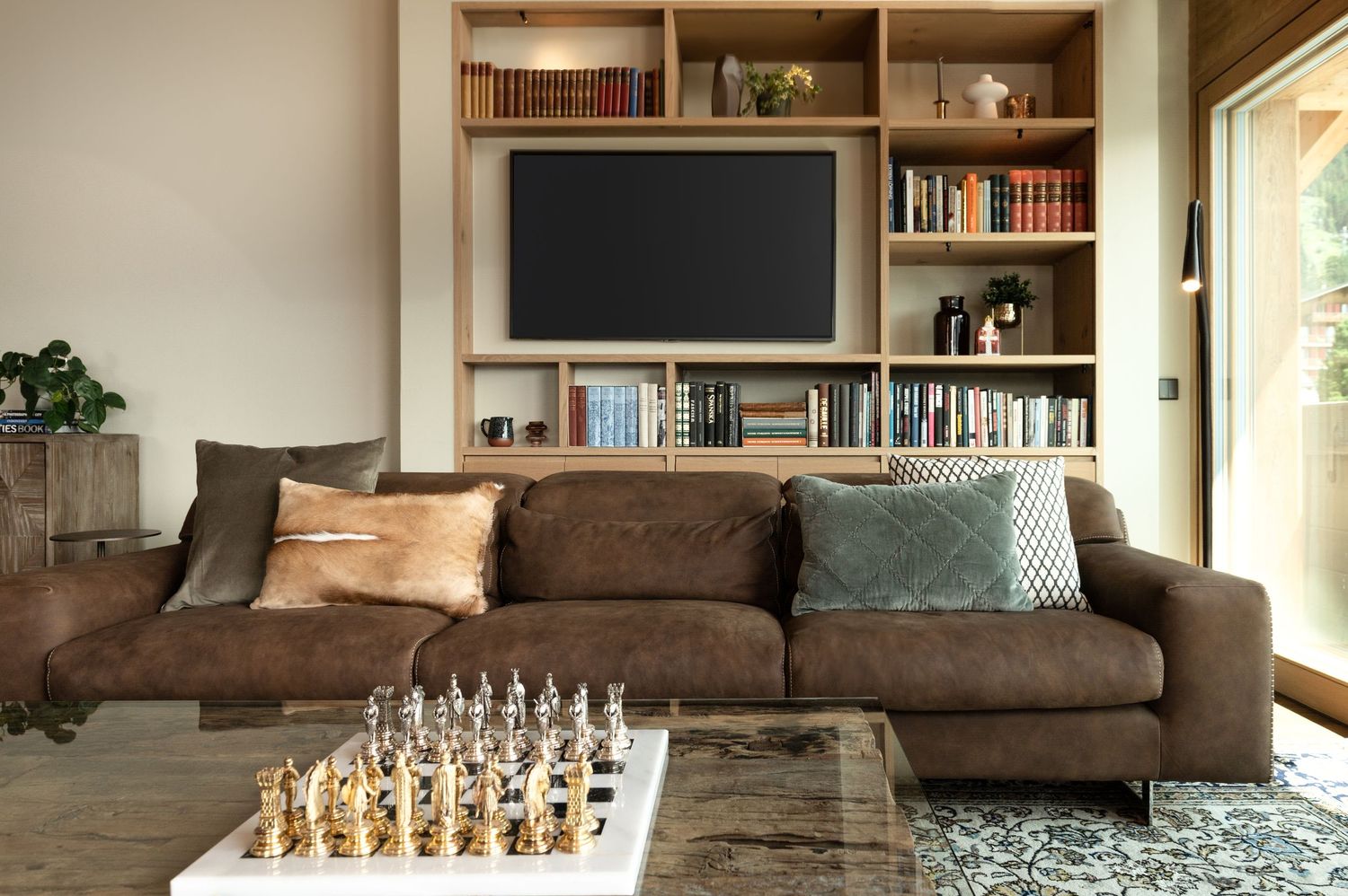 Living Etc, I Keep Seeing TVs *Behind* Sofas in Two Couch Living Rooms — But Does This Emerging Layout Really Make Sense? MALA Interior, Mar