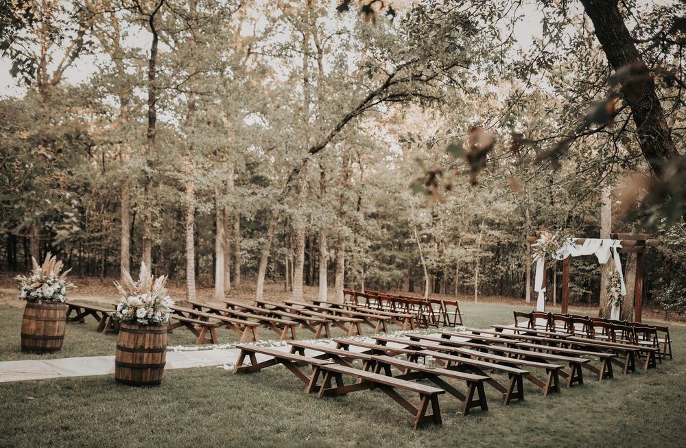 a rustic wedding venue ceremony site in the woods