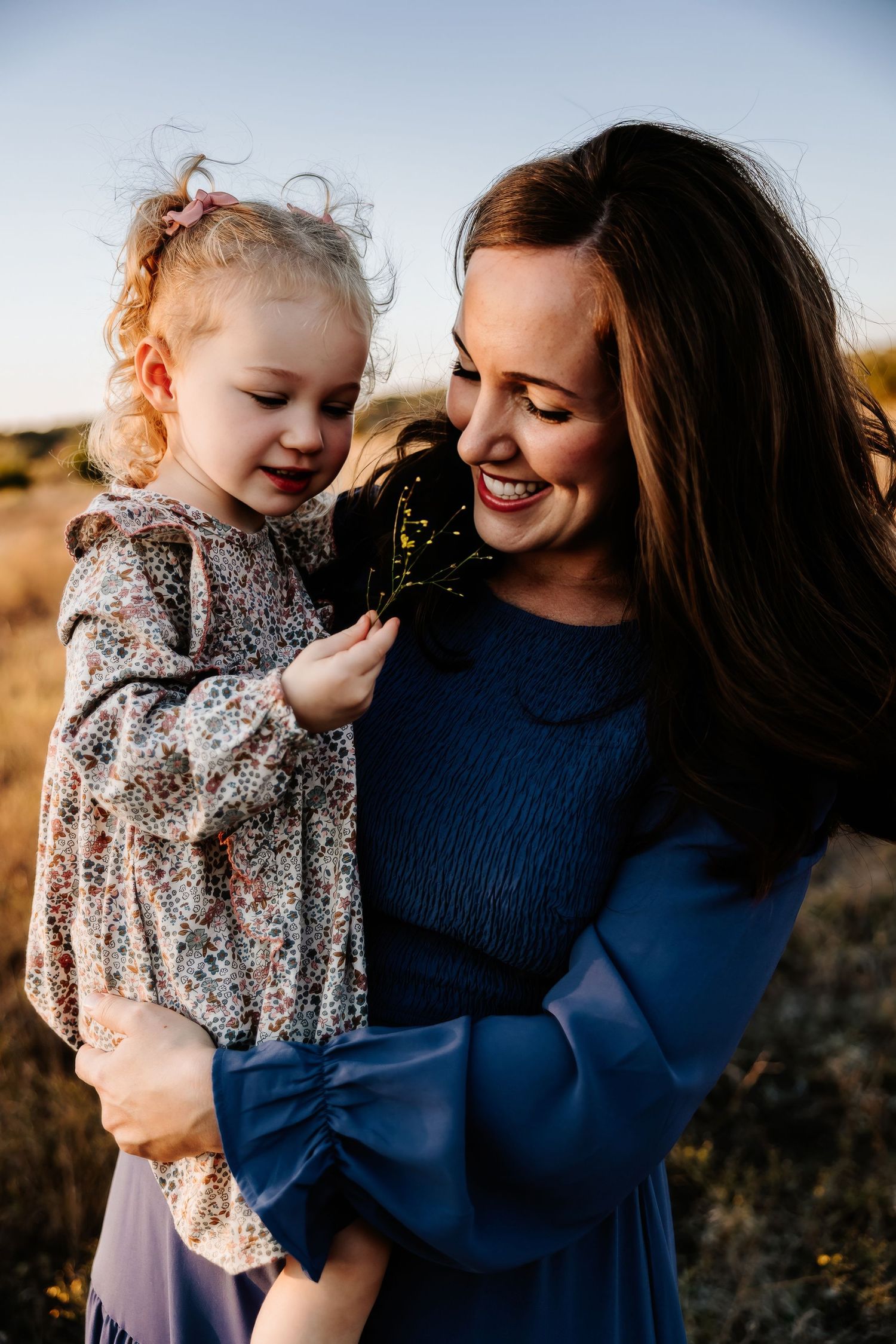 Austin family photographer captures tender moment between mom and baby in black-and-white outdoor session