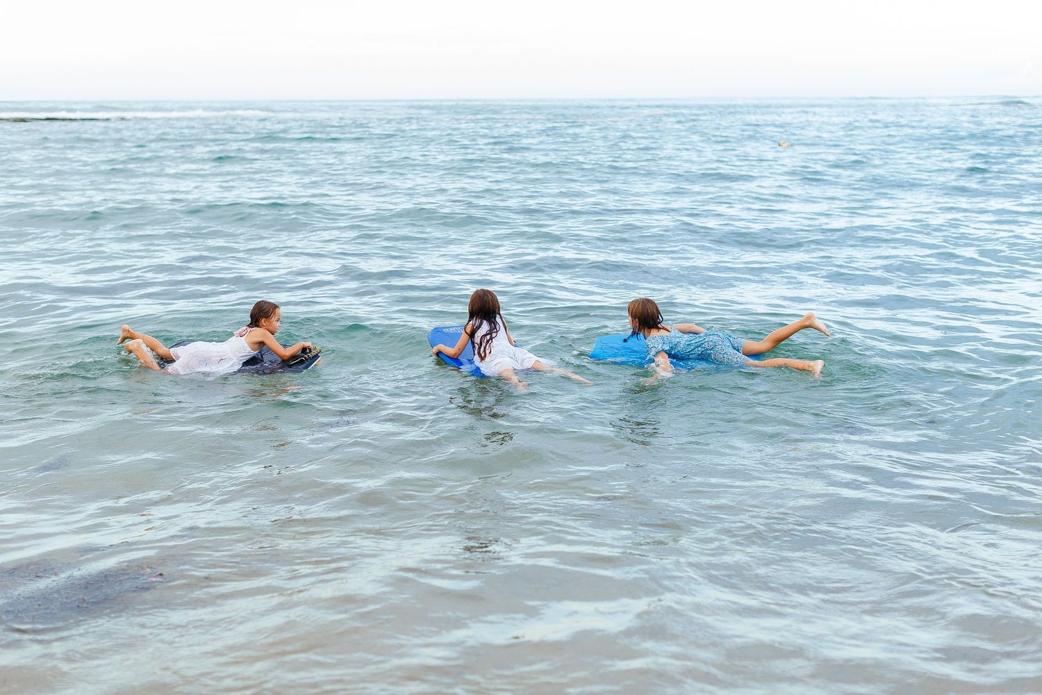 Three girls at the beach in Dorado, Puerto Rico.