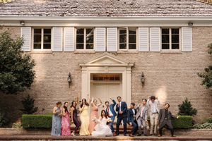 Panoramic collage of exterior wedding venue photos showing stone building facade and groups gathered at different times of day.