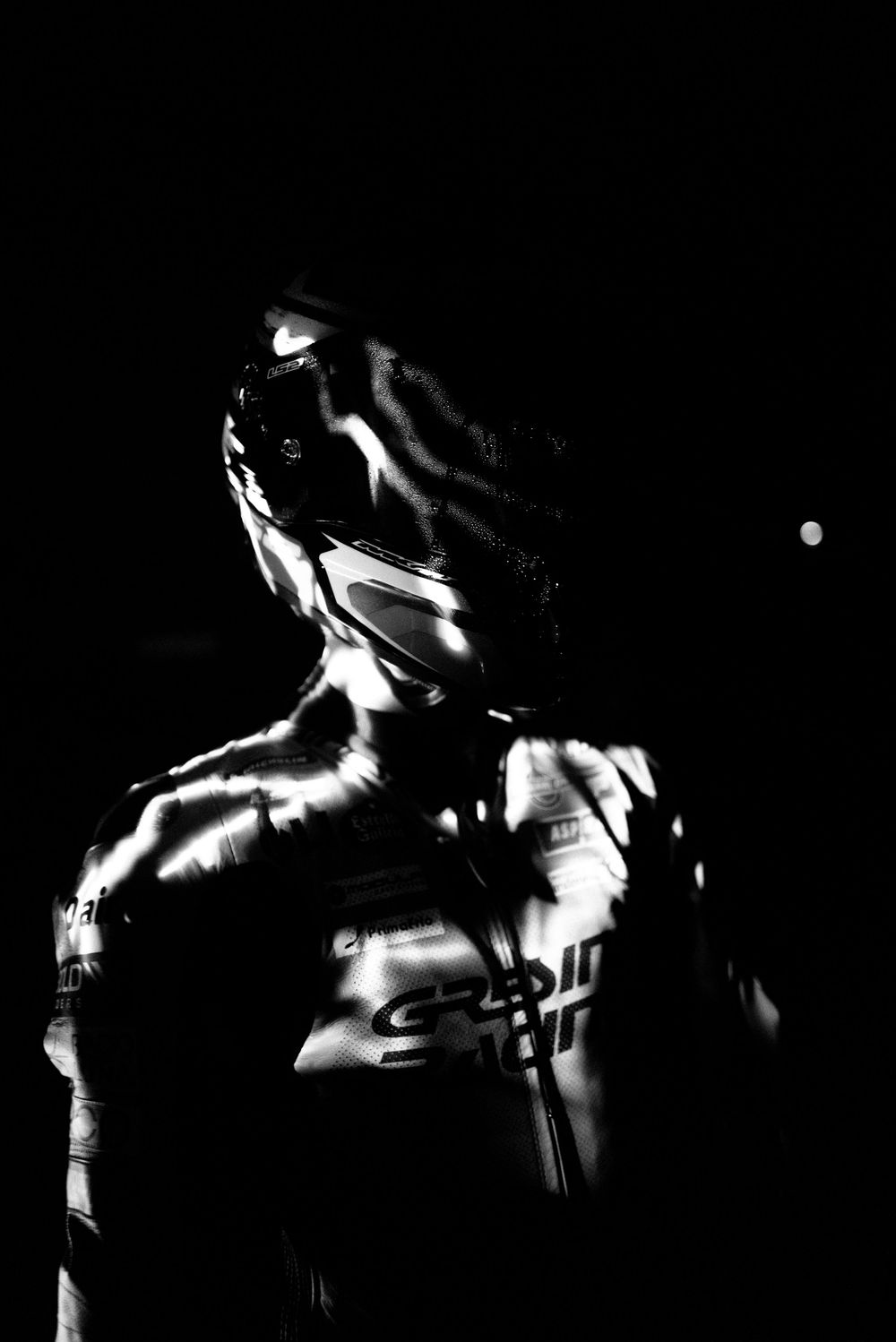 Artistic black and white silhouette series showing dynamic movement against a dark background.