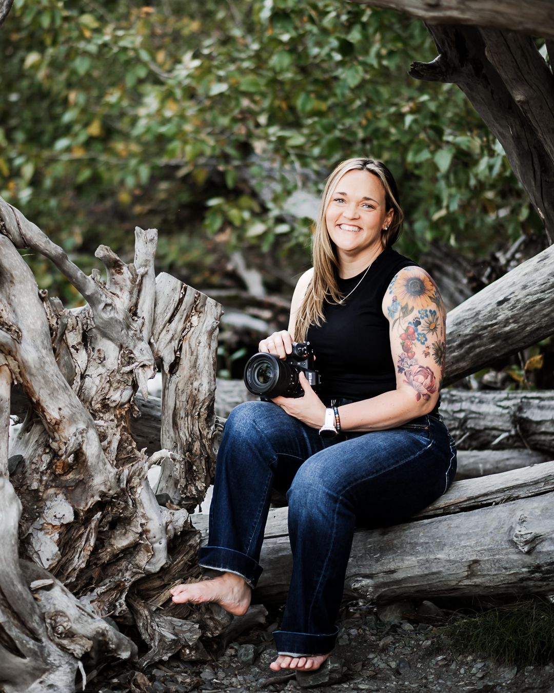 Wandering Roots Collective photographer Nicole Rogers in natural outdoor setting.