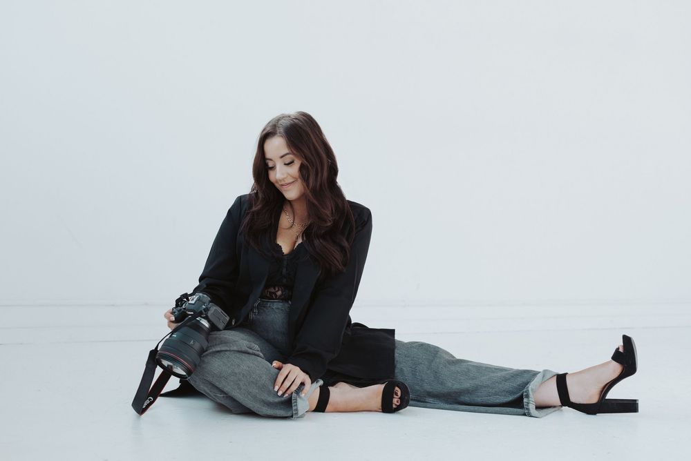 Artistic sequence showing relaxed poses in casual attire on white floor.