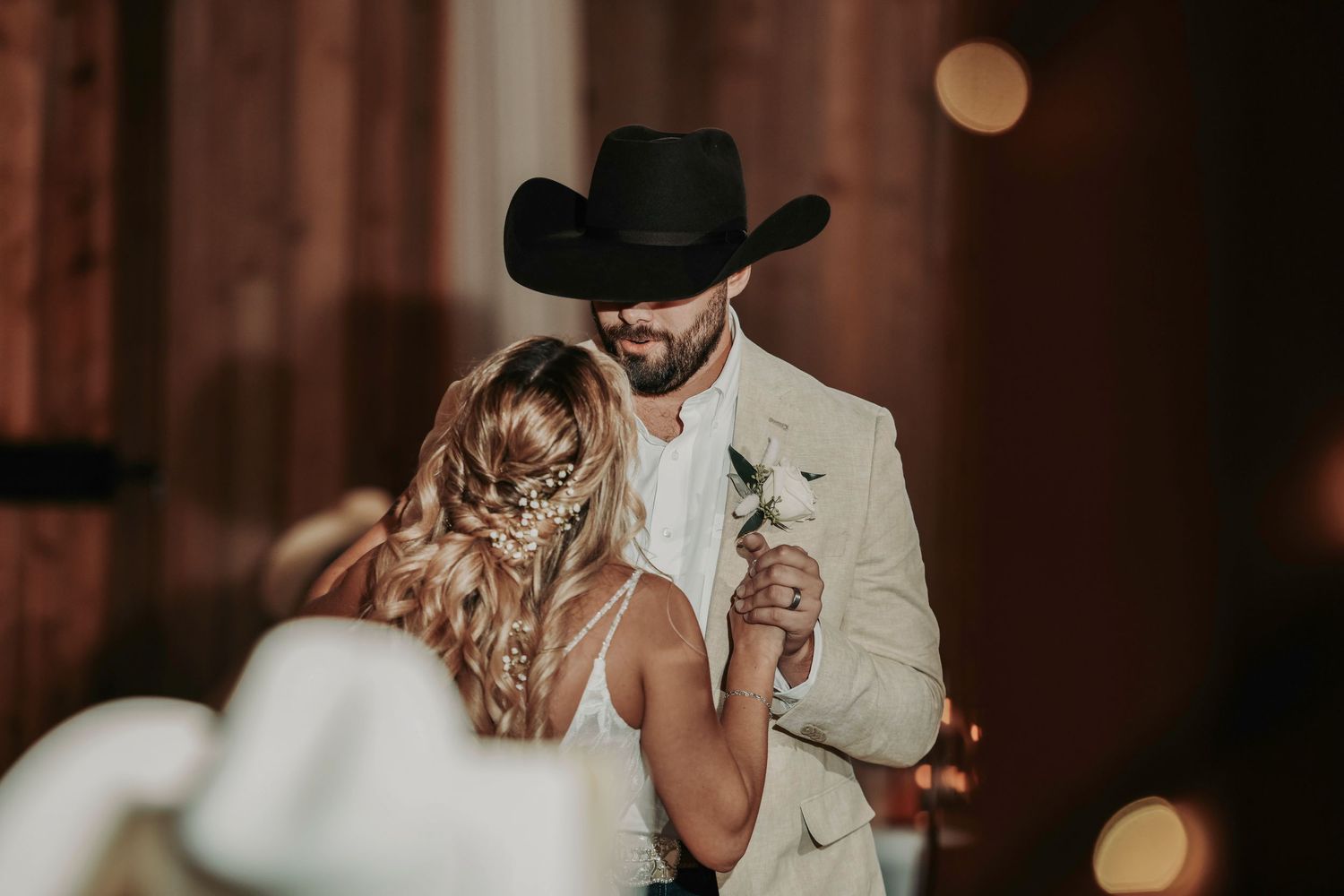Lively Texas wedding reception with cowboy boots and country vibes