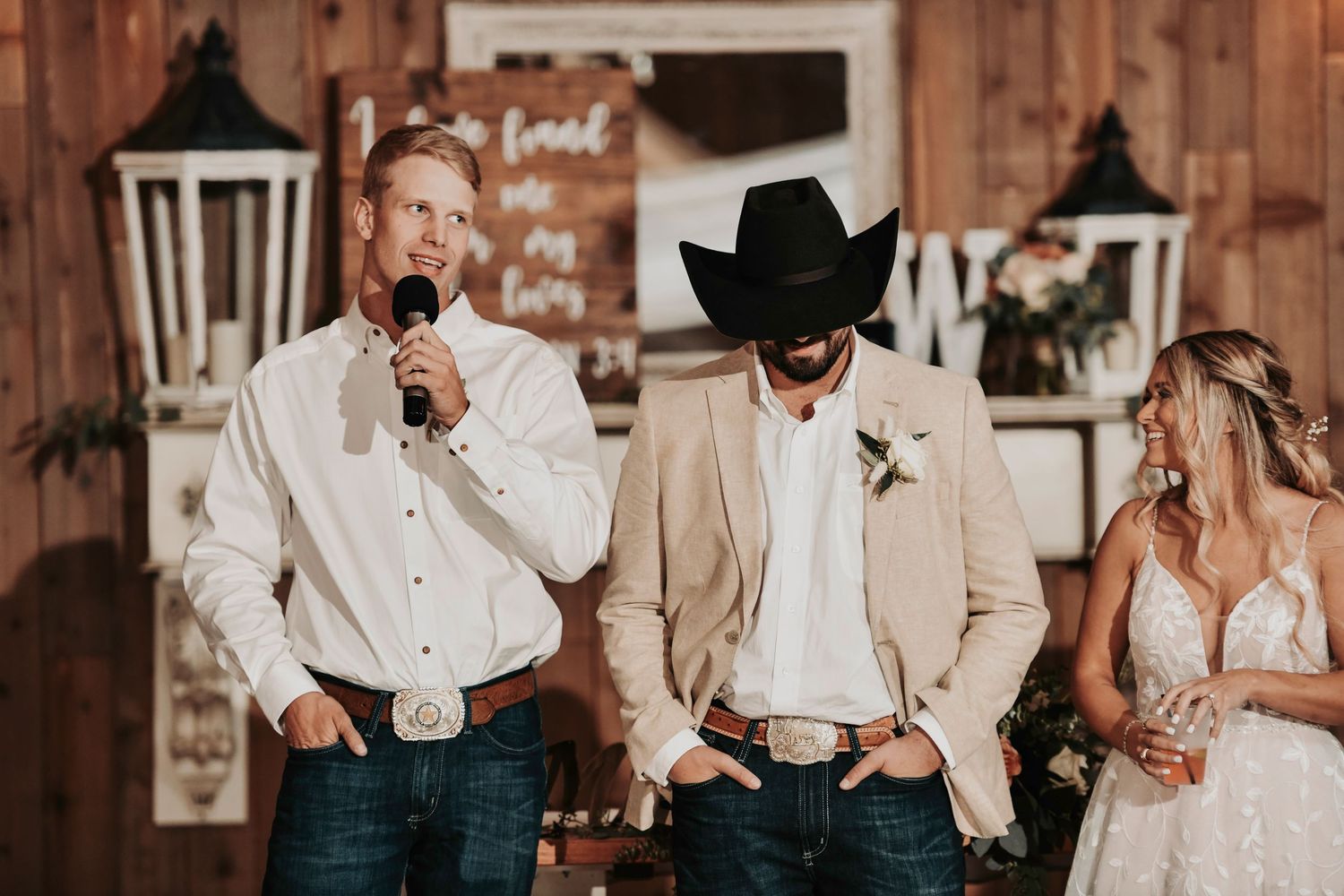 Best man raising glass for wedding toast – April Pinto Photography