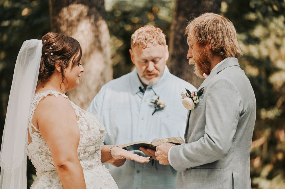 Groom seeing bride for first time during ceremony at Whispering Oaks by April Pinto Photography.