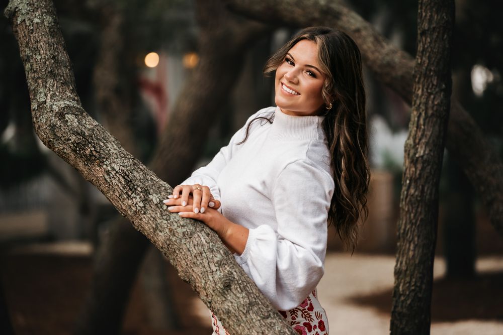 Rural Senior Portrait taken at the Seaside Shops off 30A with nice natural light and friendly poses.