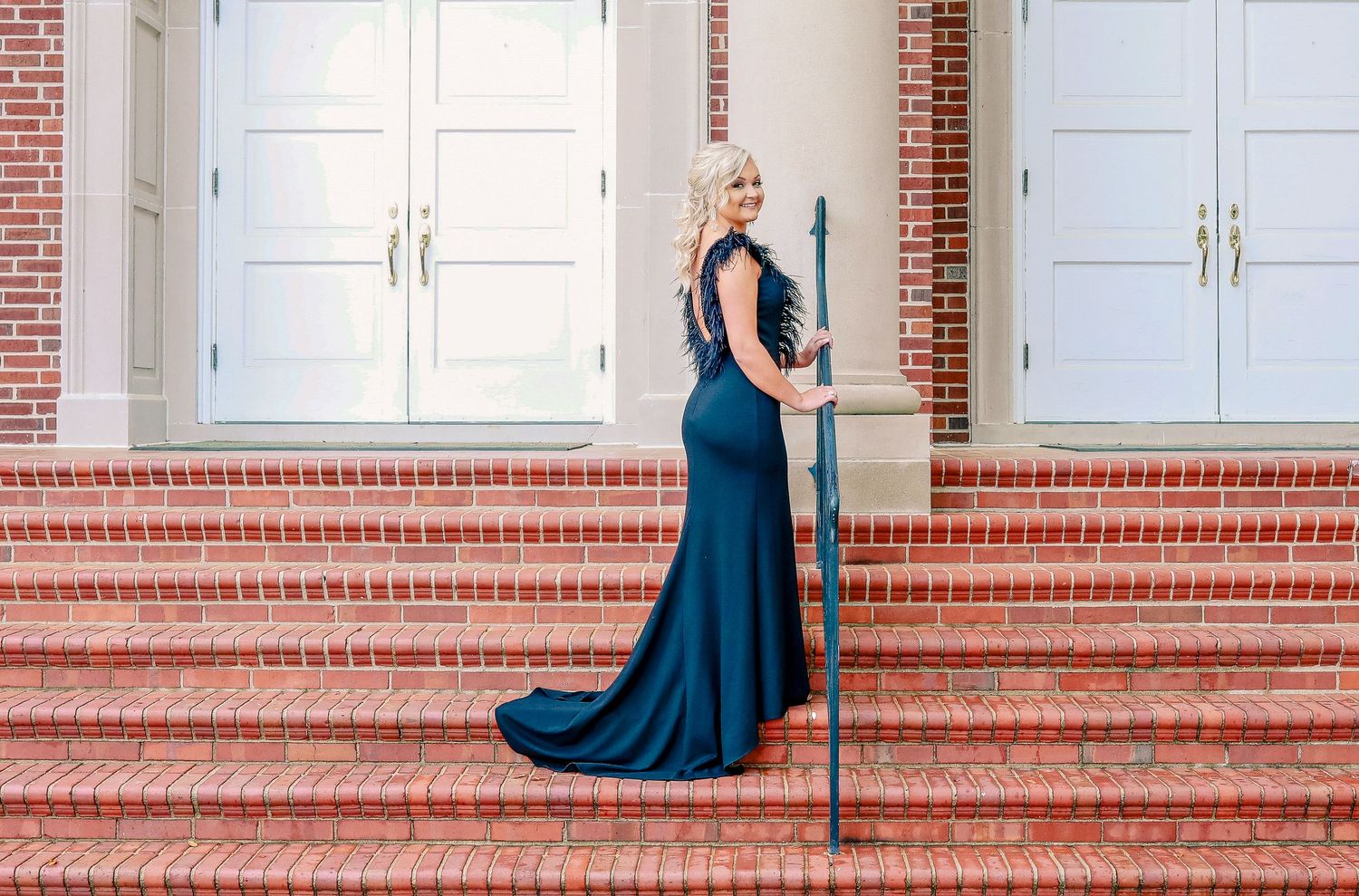 Prom portrait with black formal dress, on church stairs downtown,  Windsor Ontario.