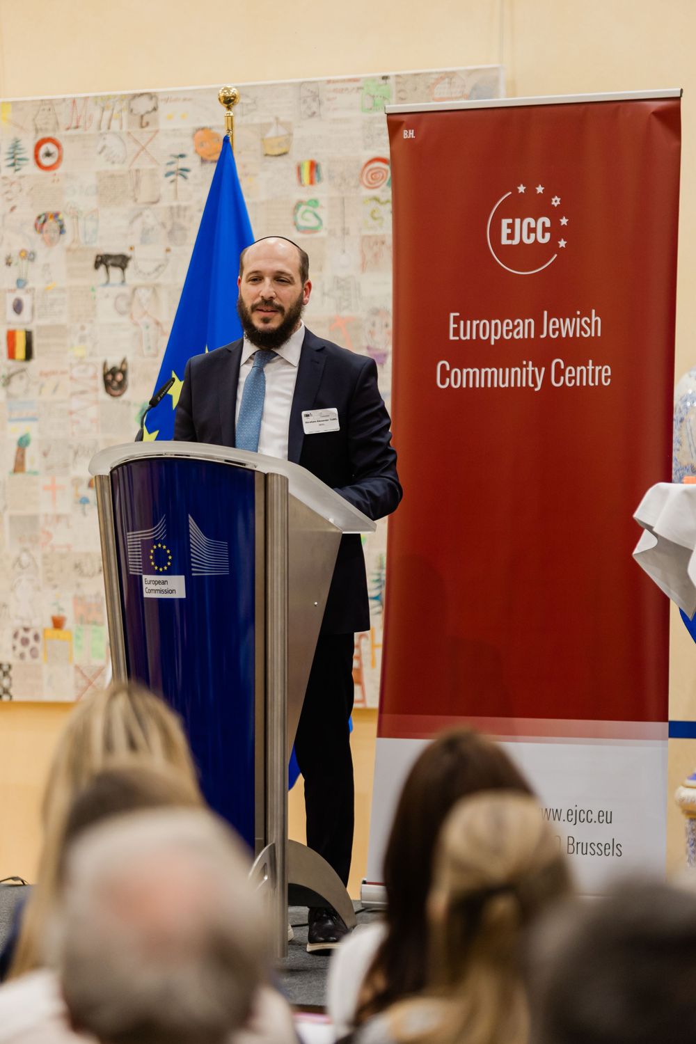 Corporate event photographer in Europe documenting strategic dialogue during international event.