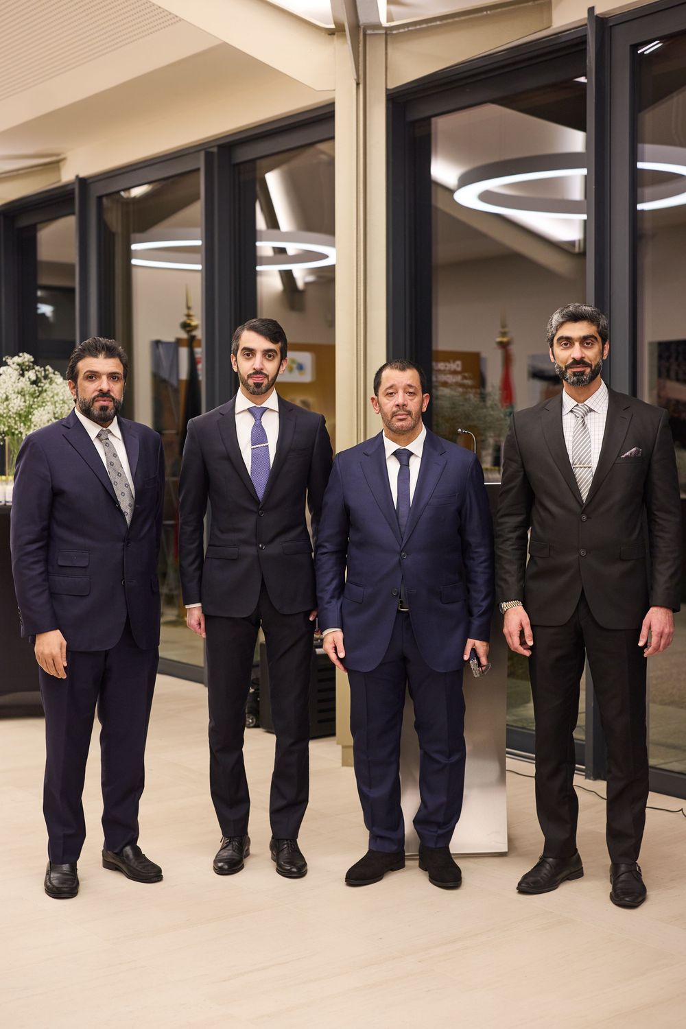 Corporate event photographer in Brussels highlighting networking moment during leadership forum.