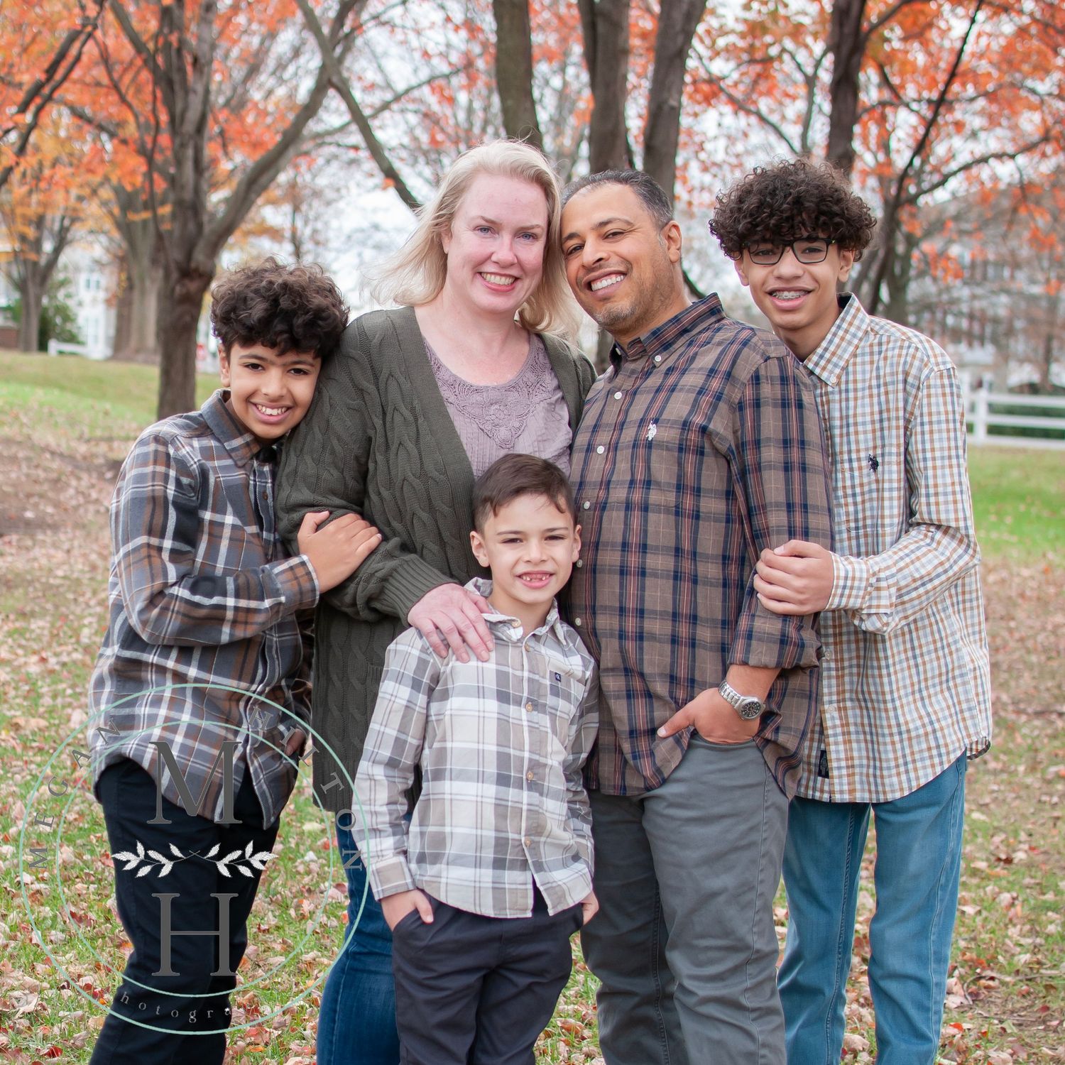 Photo of a family of 5 with plaids