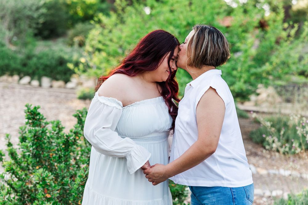 Royal High School senior posing at Conejo Valley Botanical Gardens in Ventura County, capturing natural light and joyful outdoor portraits.