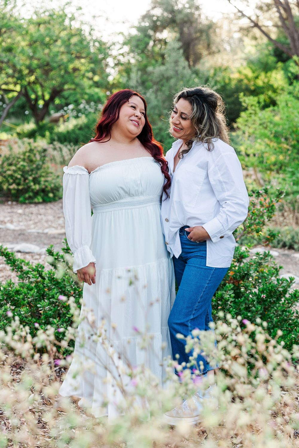 Royal High School senior posing at Conejo Valley Botanical Gardens in Ventura County, capturing natural light and joyful outdoor portraits.