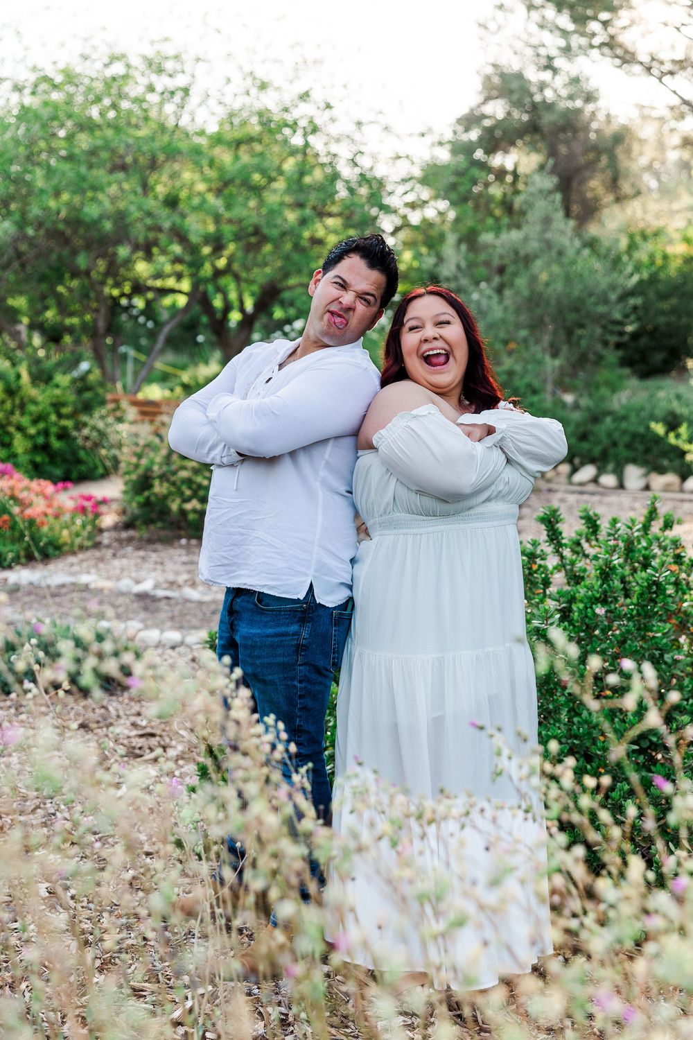 Royal High School senior posing at Conejo Valley Botanical Gardens in Ventura County, capturing natural light and joyful outdoor portraits.