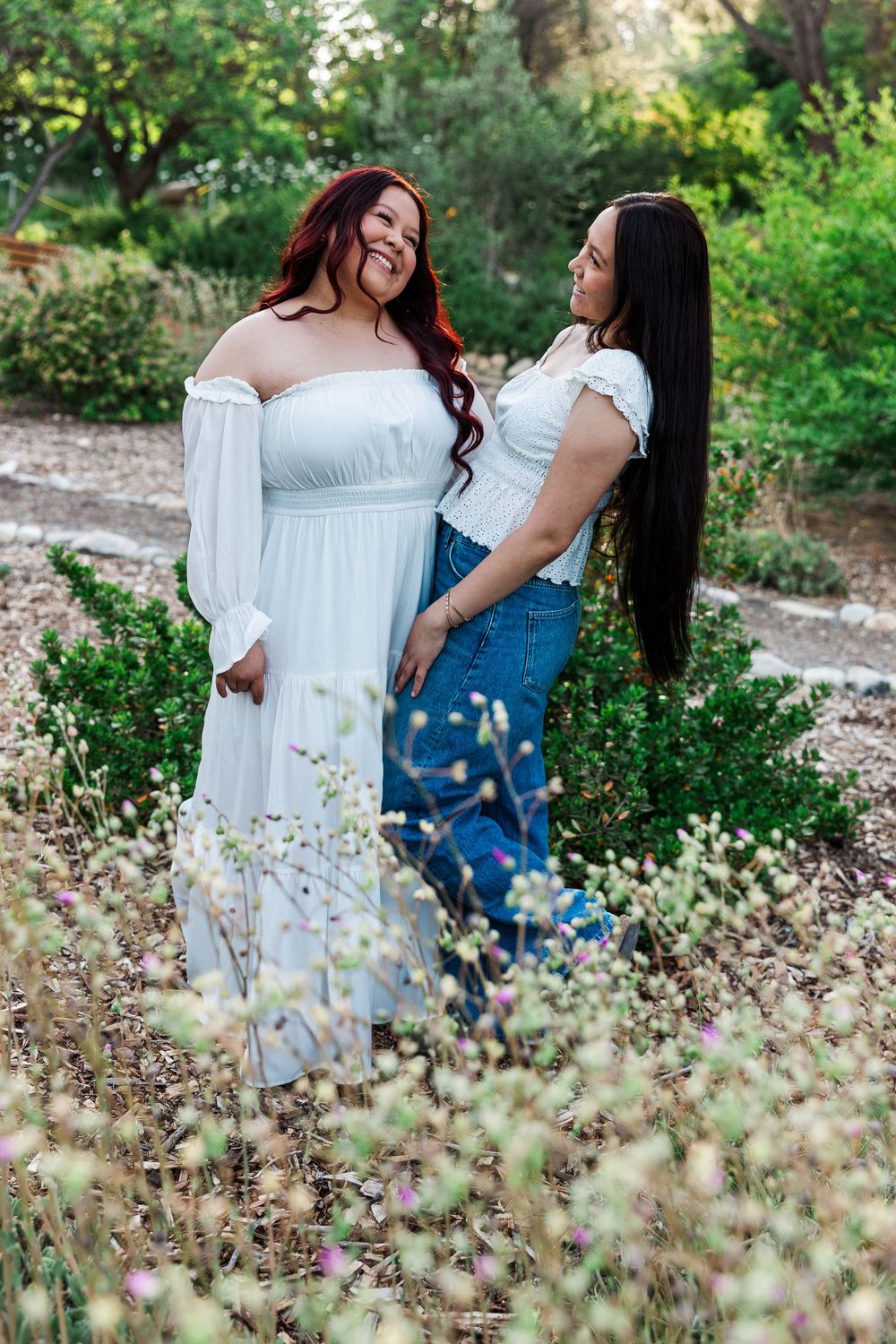 Royal High School senior posing at Conejo Valley Botanical Gardens in Ventura County, capturing natural light and joyful outdoor portraits.
