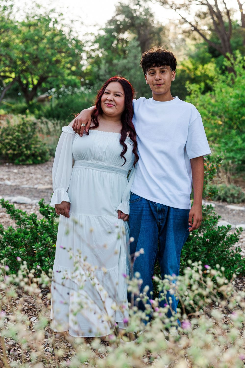 Royal High School senior posing at Conejo Valley Botanical Gardens in Ventura County, capturing natural light and joyful outdoor portraits.