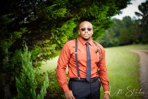 A series of black and white photographs showing groomsman portrait  in formal attire adjusting their tie in a wooded setting.