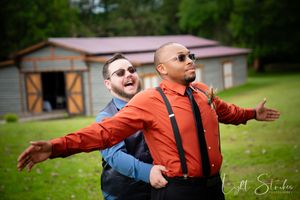 A series of dynamic poses showing groom and groomsman in an orange dress shirt and suspenders having fun posing on a farm rustic wedding.